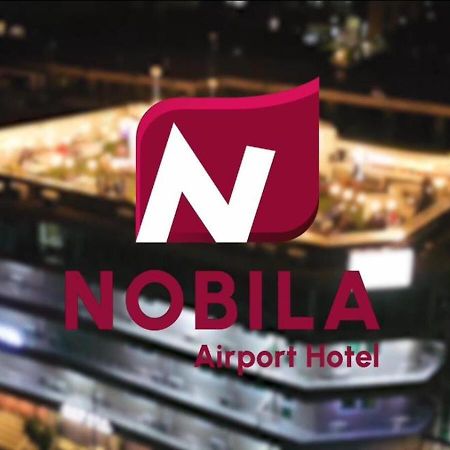 Nobila Airport Hotel Cotonou Buitenkant foto